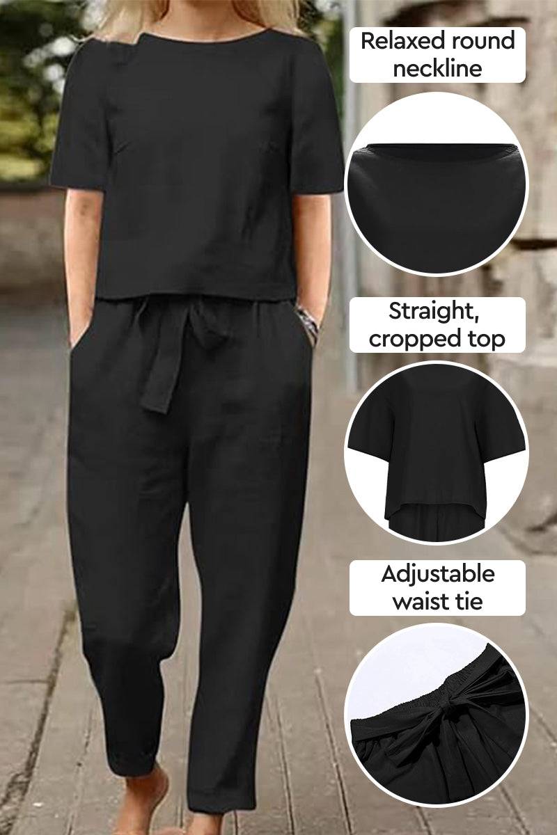 Black cotton-linen blend two-piece set with relaxed round neckline, cropped top, and adjustable waist tie