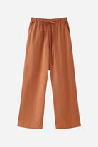 Rusty orange wide-leg pants from versatile Mix-Match Lounge-to-Travel Set, comfortable and stylish for travel and casual wear.