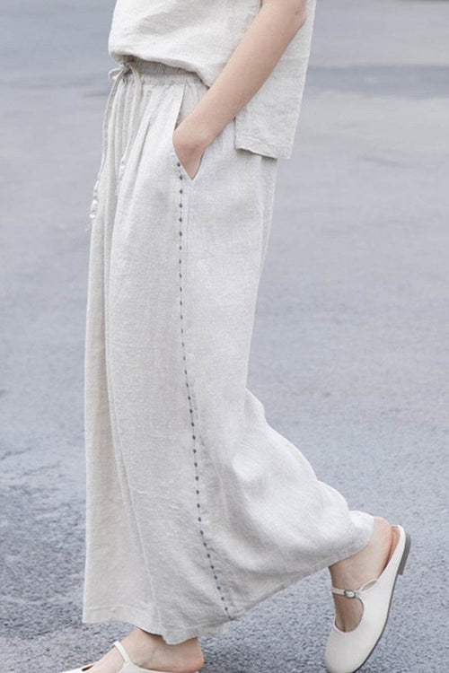 100% linen wide-leg pants with elastic waist and breathable fabric for comfortable, stylish wear