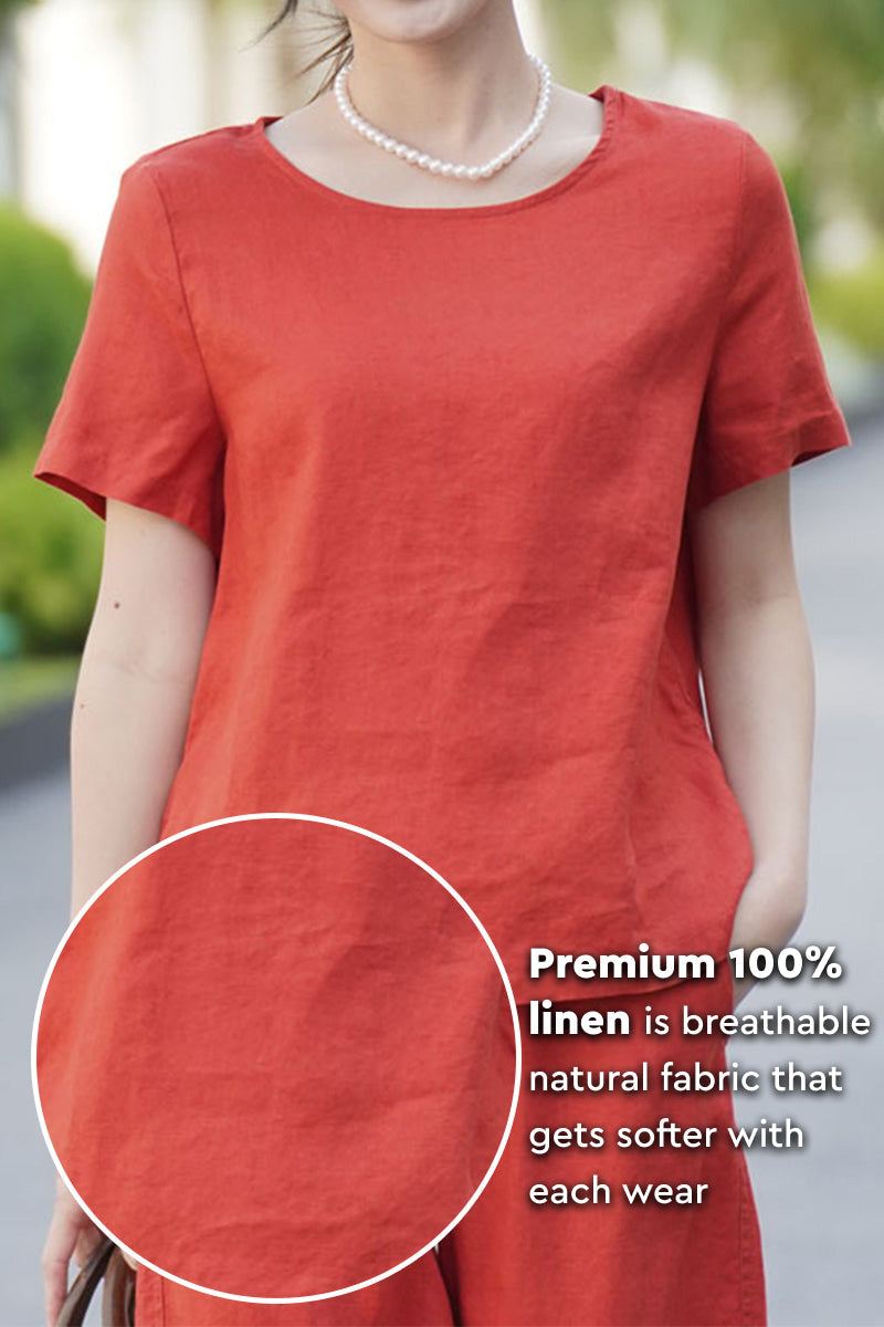 Woman wearing breathable 100% pure linen short sleeve classic shirt in rust color with round neckline