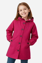 Junior water resistant oversized hooded windbreaker rain jacket for kids in bright pink color
