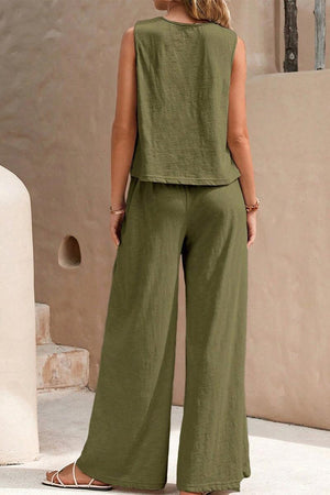 Woman wearing olive green sleeveless wide leg pants set with soft, wrinkle-resistant fabric, perfect for travel and casual occasions