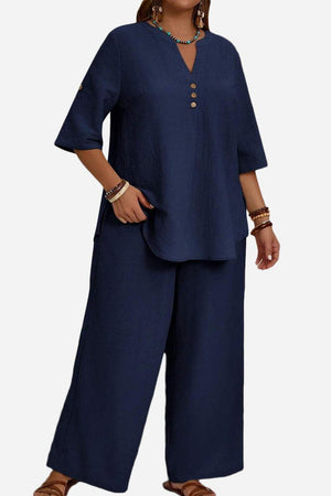 Navy wrinkle-free wide leg pants and button-front top set for comfortable elegant travel wear