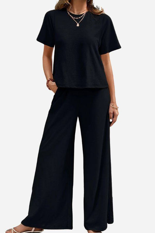 Riviera Relaxed Two Piece Set black loose fit top and wide-leg pants for comfortable travel and casual elegance