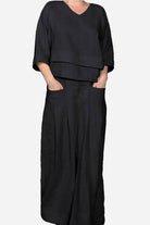 Atelier Serenity Layered Two-Piece Set black relaxed wide-leg trousers and layered V-neck top for breathable comfortable elegance
