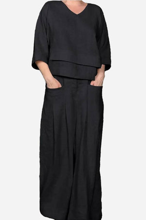 Atelier Serenity Layered Two-Piece Set black relaxed wide-leg trousers and layered V-neck top for breathable comfortable elegance
