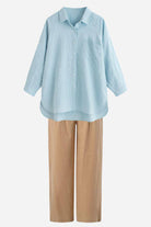 Linen Breeze Set featuring breathable light blue linen-cotton shirt with beige high-waist pants for summer comfort and style