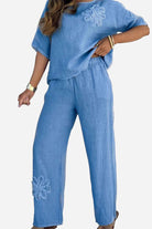 Blue breathable two piece set with floral embroidery and relaxed fit for all-day comfort
