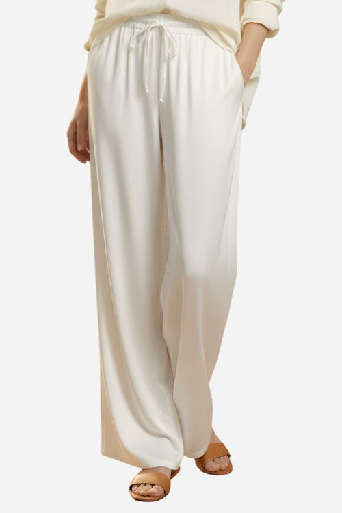 White Subtle Moves Silk Wide Leg Trousers with high waist and relaxed fit for breathable comfort and elegant drape