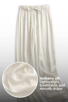 Subtle Moves Silk Wide Leg Trousers in ivory, made from lightweight mulberry silk blend with breathable, smooth drape and high waist design.