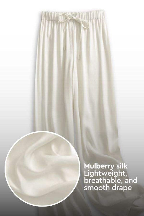 Subtle Moves Silk Wide Leg Trousers in ivory, made from lightweight mulberry silk blend with breathable, smooth drape and high waist design.