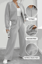 The Voyager Zip Set gray zip-front sweatshirt and wide-leg joggers with adjustable waist and soft micro-elastic fabric for comfortable travel and casual wear