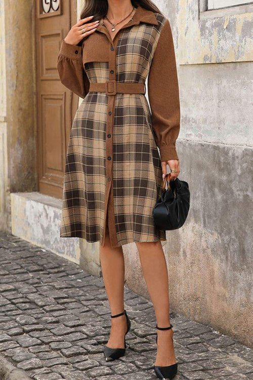 Retro corduroy dress with plaid pattern, belted waist, and long sleeves in brown tones.