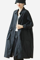 Black Nomad Ease oversized shirt-jacket with roll-up sleeves and large front pockets worn by a model