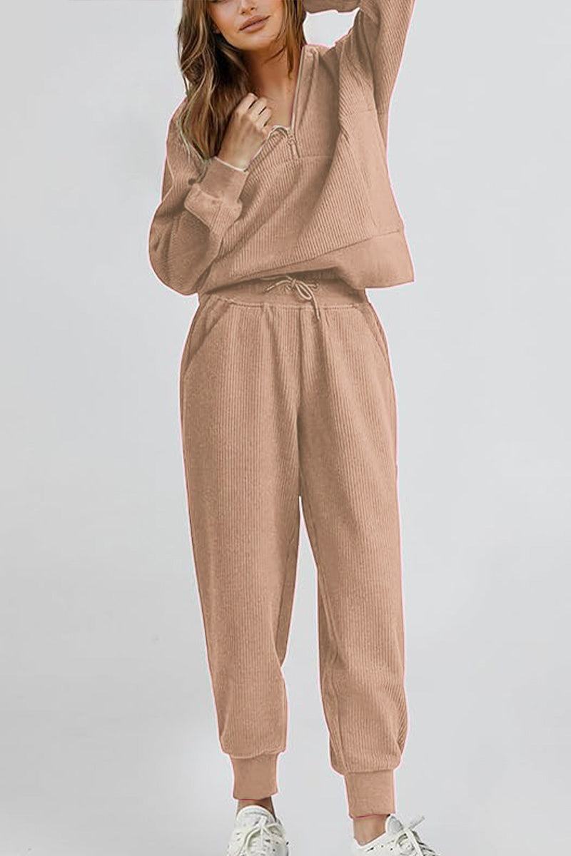Unisex half-zip pullover and sweatpants set in beige, lightweight polyester blend, casual cozy loungewear.