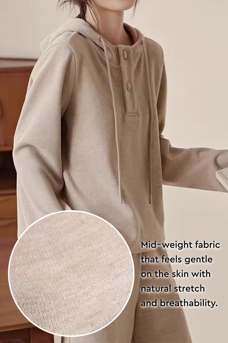 Quiet Comfort Everyday two-piece set with soft mid-weight ribbed knit hoodie and wide-leg pants for breathable, relaxed elegance.