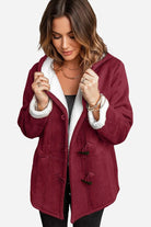 Women's warm toggle button hooded coat with faux suede exterior and sherpa lining