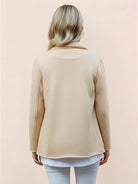 Modern double-breasted blazer with raw-edge seaming and patch pockets