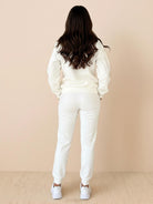 Colorblock Comfort Tracksuit with contrast curved panels and relaxed fit for flattering, wrinkle-resistant travel wear