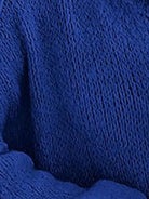 Oversized button-front knit cardigan with balloon sleeves and gold-tone buttons