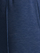 Soft knit wide-leg pants with elastic waist and side pockets in breathable fabric