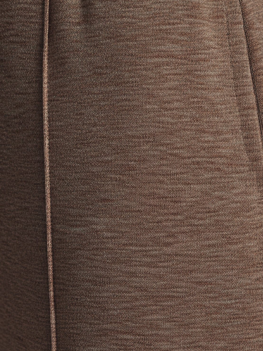 Soft knit wide-leg pants with breathable fabric, elastic drawstring waist, and functional side pockets for a relaxed everyday fit