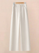 White wide-leg thermal wool blend trousers with elastic back waist and tailored suit-style front