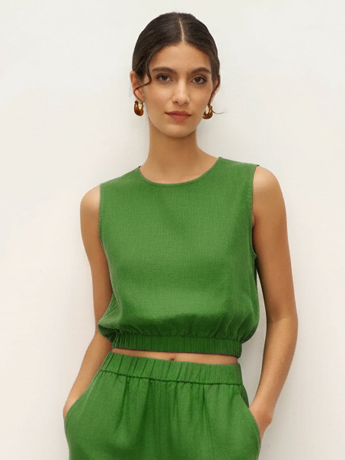 Lightweight linen-blend sleeveless top and wide-leg pants set with elastic waistband and side slits for breathability