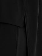 Oversized long-line loungewear set with short-sleeve pullover and wide-leg pants in soft knit fabric