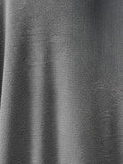 Oversized long-line loungewear set with short-sleeve pullover and wide-leg pants in soft knit fabric