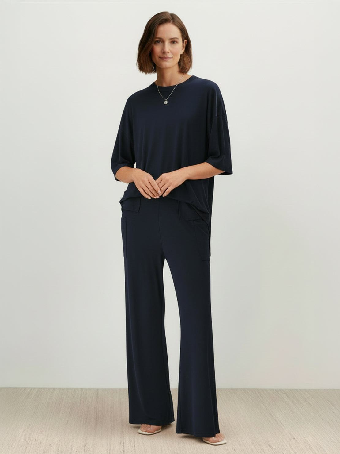 Oversized long-line loungewear set with short-sleeve pullover and wide-leg pants in soft knit fabric