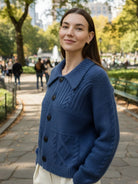 Lightweight wool-blend button-front cardigan with wide collar and anti-pilling knit surface for layering and warmth