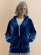 Ultra-soft velvet half-zip hoodie with kangaroo pocket and relaxed tunic fit