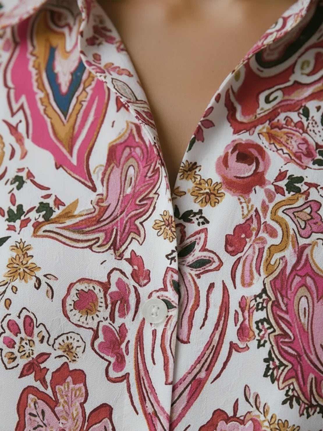 Floral button-down shirt with long roll-up sleeves and hip-length relaxed fit