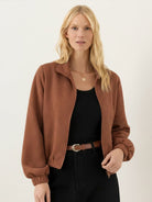 Cropped textured baseball jacket with full zipper, elastic cuffs, and waistband in soft fabric