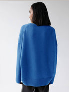 Oversized crew neck knit sweater with drop-shoulder sleeves and ribbed cuffs and hem