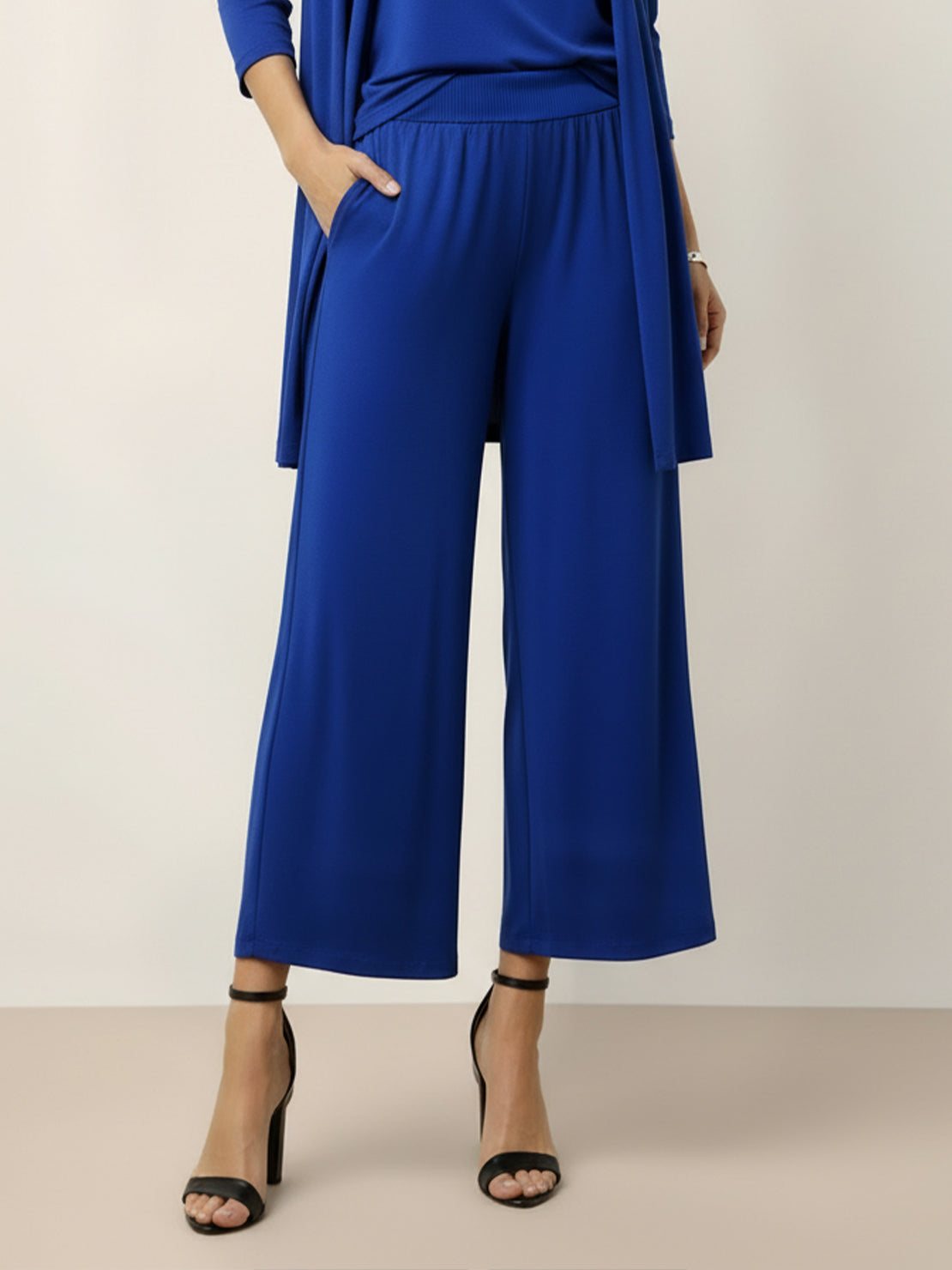 Open-front three-piece co-ord with longline cardigan, tank top, and wide-leg trousers in lightweight knit fabric