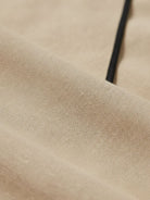 Knot-waist maxi dress with V-neckline, batwing sleeves, and flowing skirt in lightweight fabric