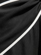 Lightweight knot-waist maxi dress with V-neckline, batwing sleeves, and flowing skirt