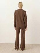 Oversized polo knit loungewear set with soft V-neck collar and straight-leg pants in soft knit fabric