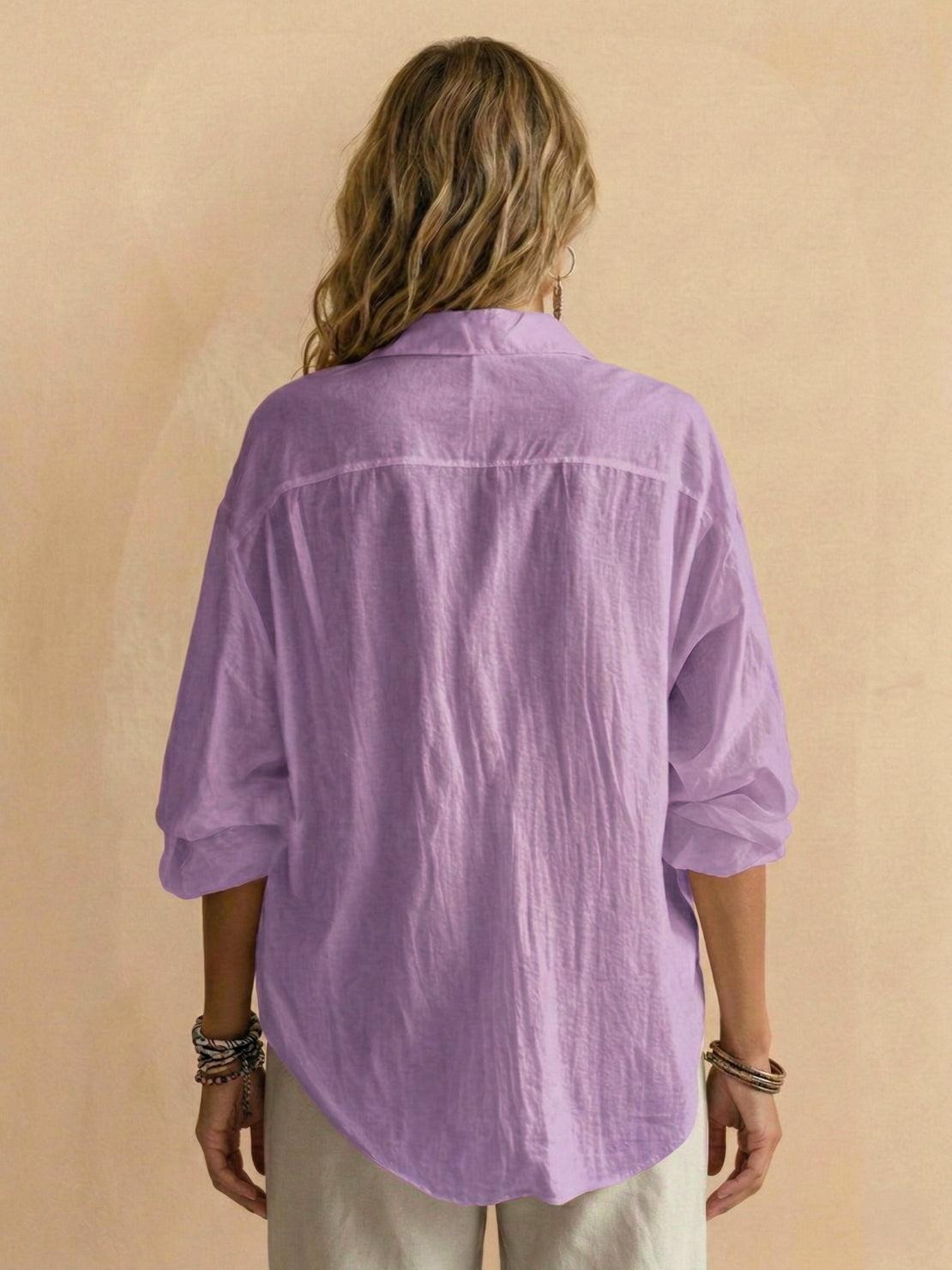 Lightweight 100% cotton popover blouse with relaxed oversized fit, classic collar, and tunic length.