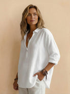 Lightweight 100% cotton popover blouse with classic collar and relaxed oversized fit