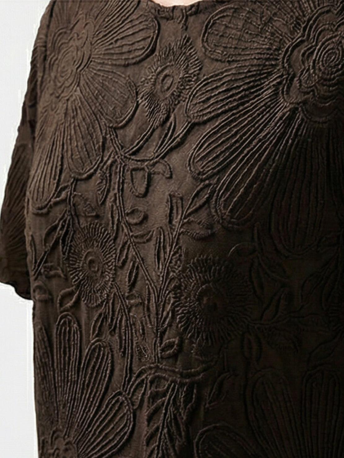 Floral jacquard pleated top with 3D floral texture, flutter sleeves, and relaxed A-line fit