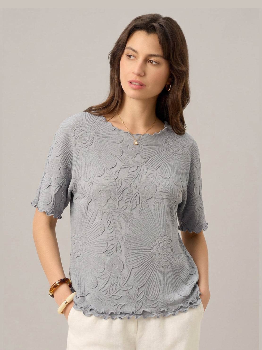 Floral Jacquard Pleated Top with flutter sleeves and 3D floral texture in relaxed A-line silhouette