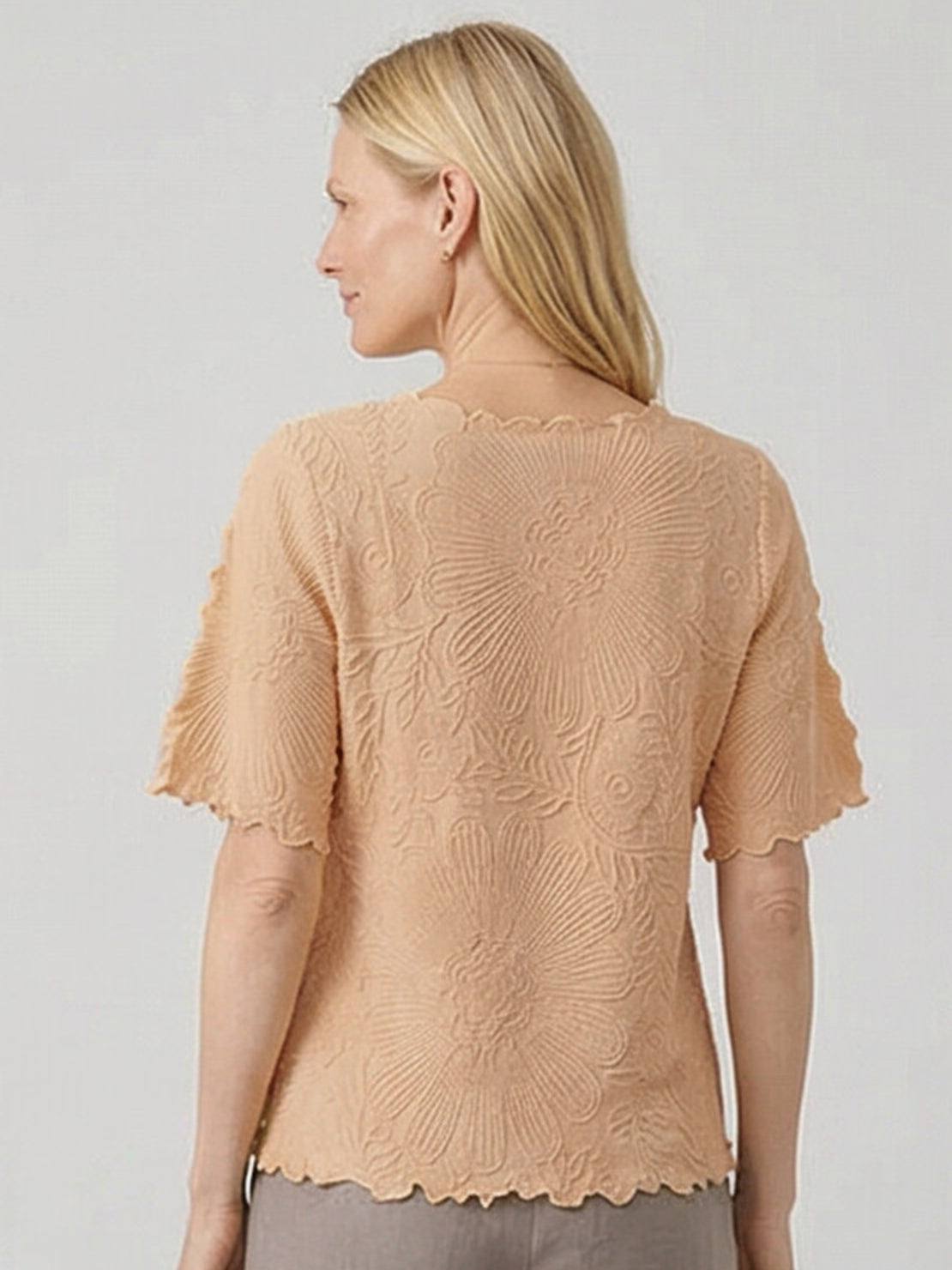 Floral jacquard pleated top with 3D floral texture, flutter sleeves, and relaxed A-line fit