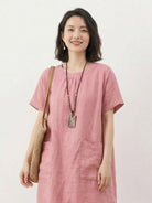 Loose fit 100% linen pocket midi dress with short sleeves and side slits