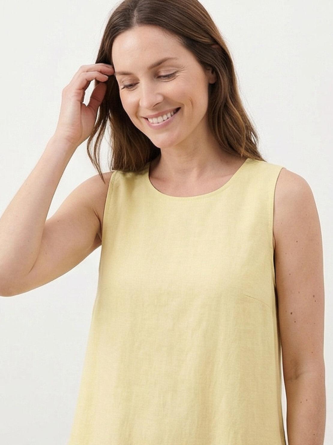 Lightweight cotton linen sleeveless maxi dress with round neckline and flowing ankle-length silhouette