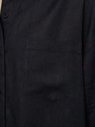 Lightweight 100% cotton-linen oversized shirt with dropped shoulders and curved hem