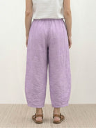100% linen harem balloon pants with elastic drawstring waistband and side pockets in natural linen texture