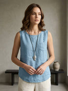 Lightweight sleeveless cotton linen top with chest pocket and curved hem